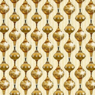a golden holiday ornaments on cream fabric